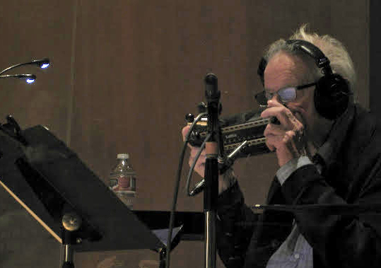 Legendary harmonica player Tommy Morgan rehearses with his bass harmonica.